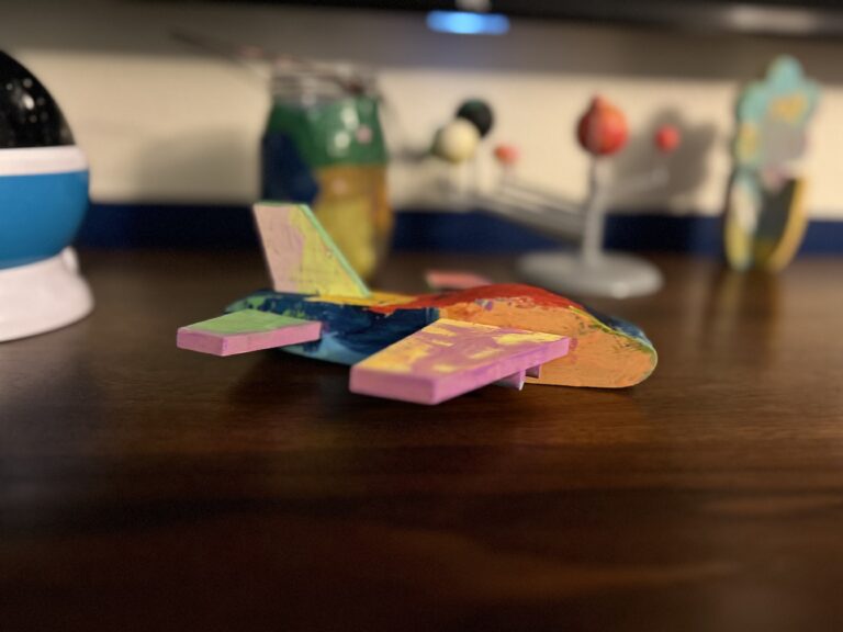 Wooden airplane project completed by child.  